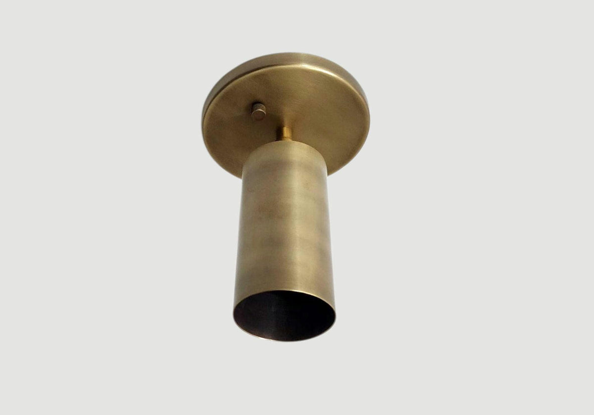 Adjustable mid-century modern brass ceiling spotlight. Ember Lighting