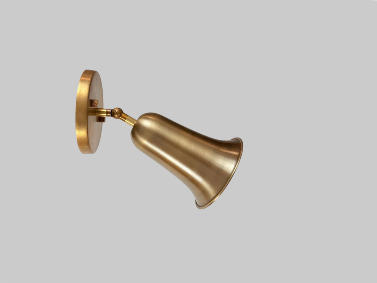Brass bell cone bedside wall light Ember Lighting