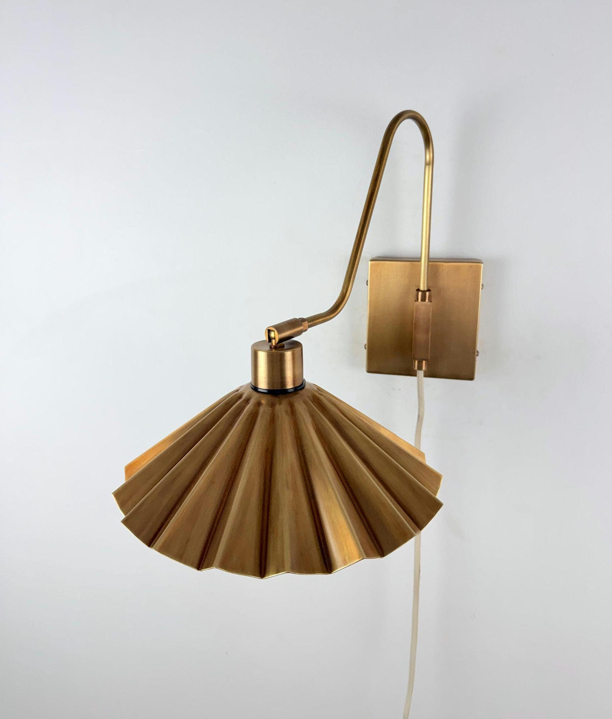 Brass Wall Sconce With Pleated Beige Fabric Shade - Ember Lighting
