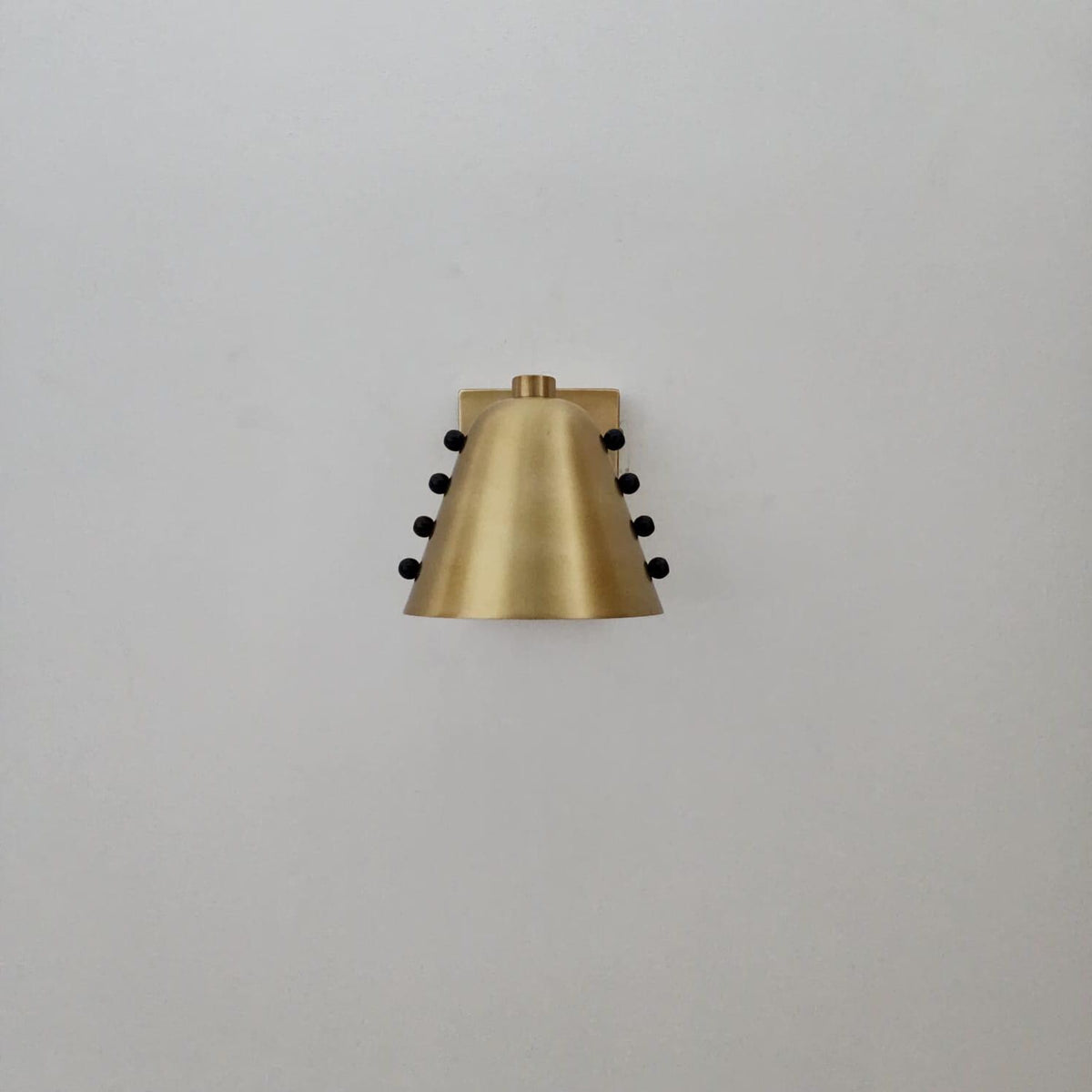 Compact Handmade Brass Wall Sconce for Modern Interiors - Ember Lighting