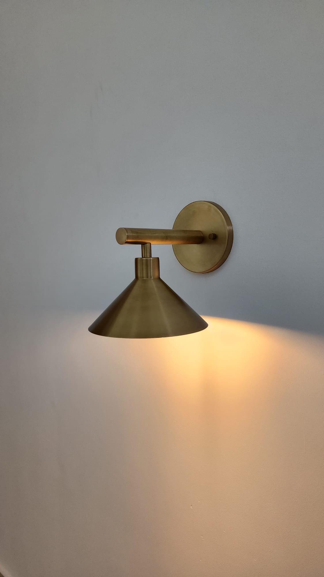 Elegant handcrafted brass double wall sconce — Ember Lighting