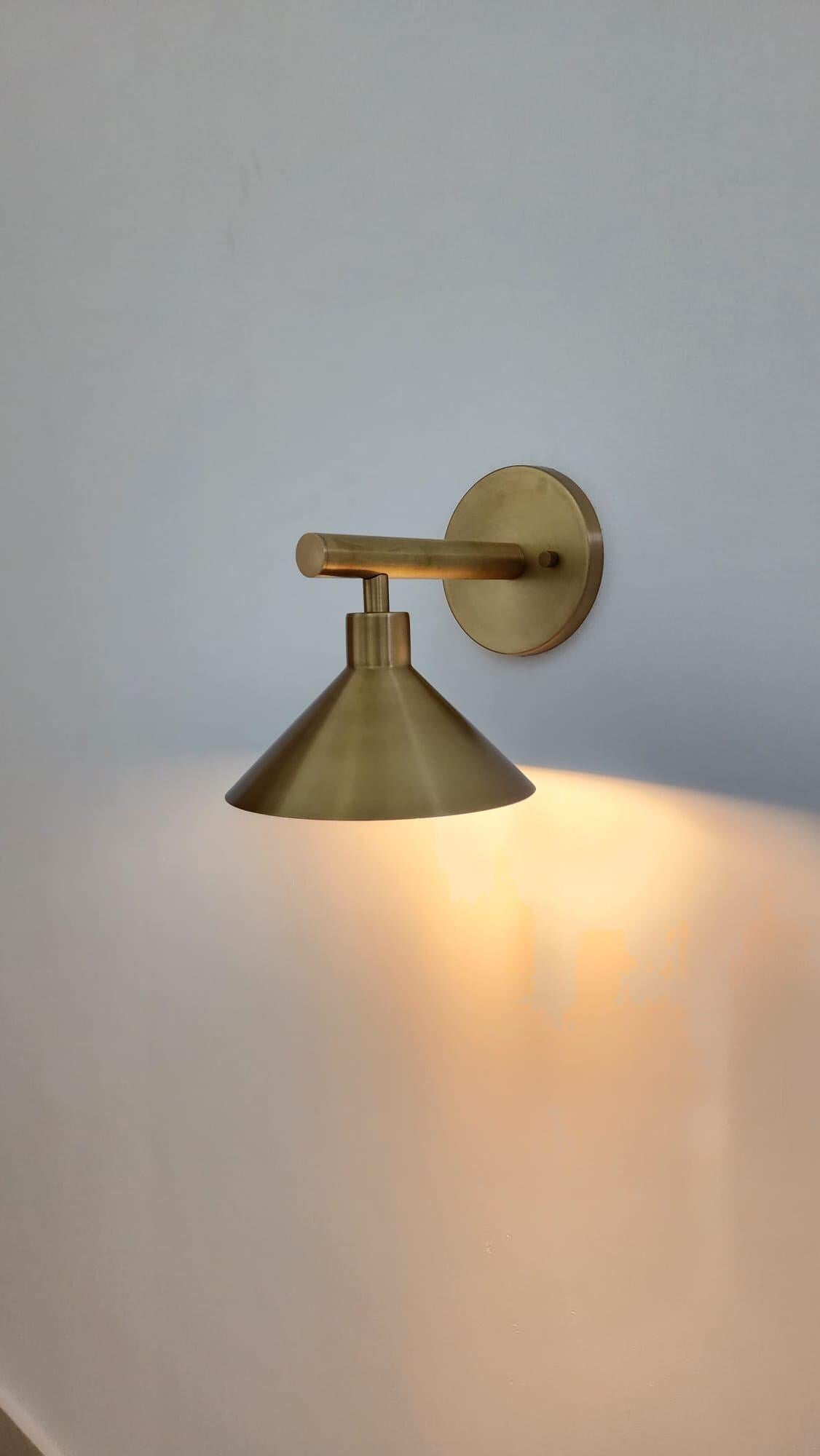 Elegant handcrafted brass double wall sconce — Ember Lighting