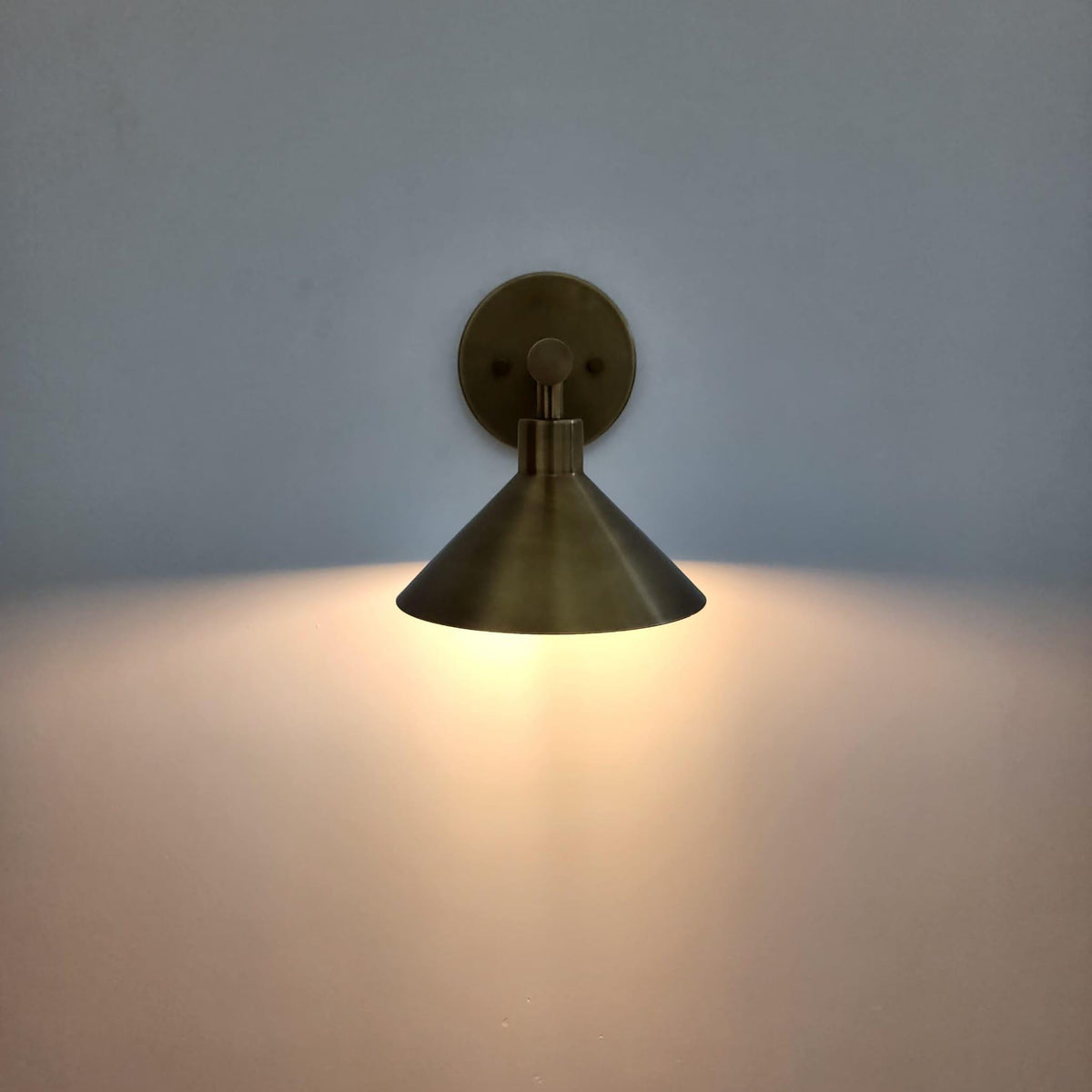Elegant handcrafted brass double wall sconce — Ember Lighting