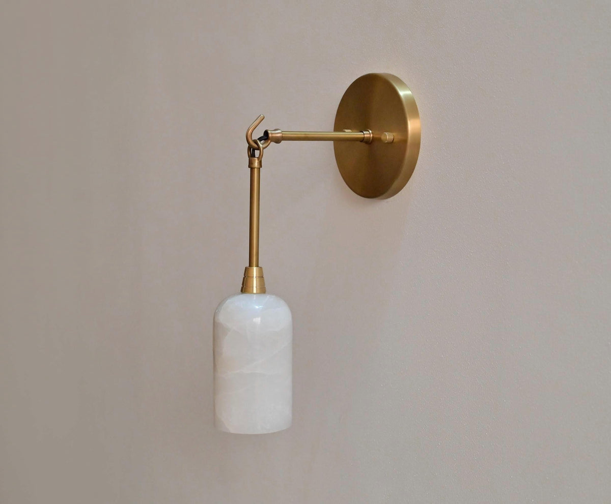 Elegant handmade alabaster and brass wall sconce design - Ember Lighting