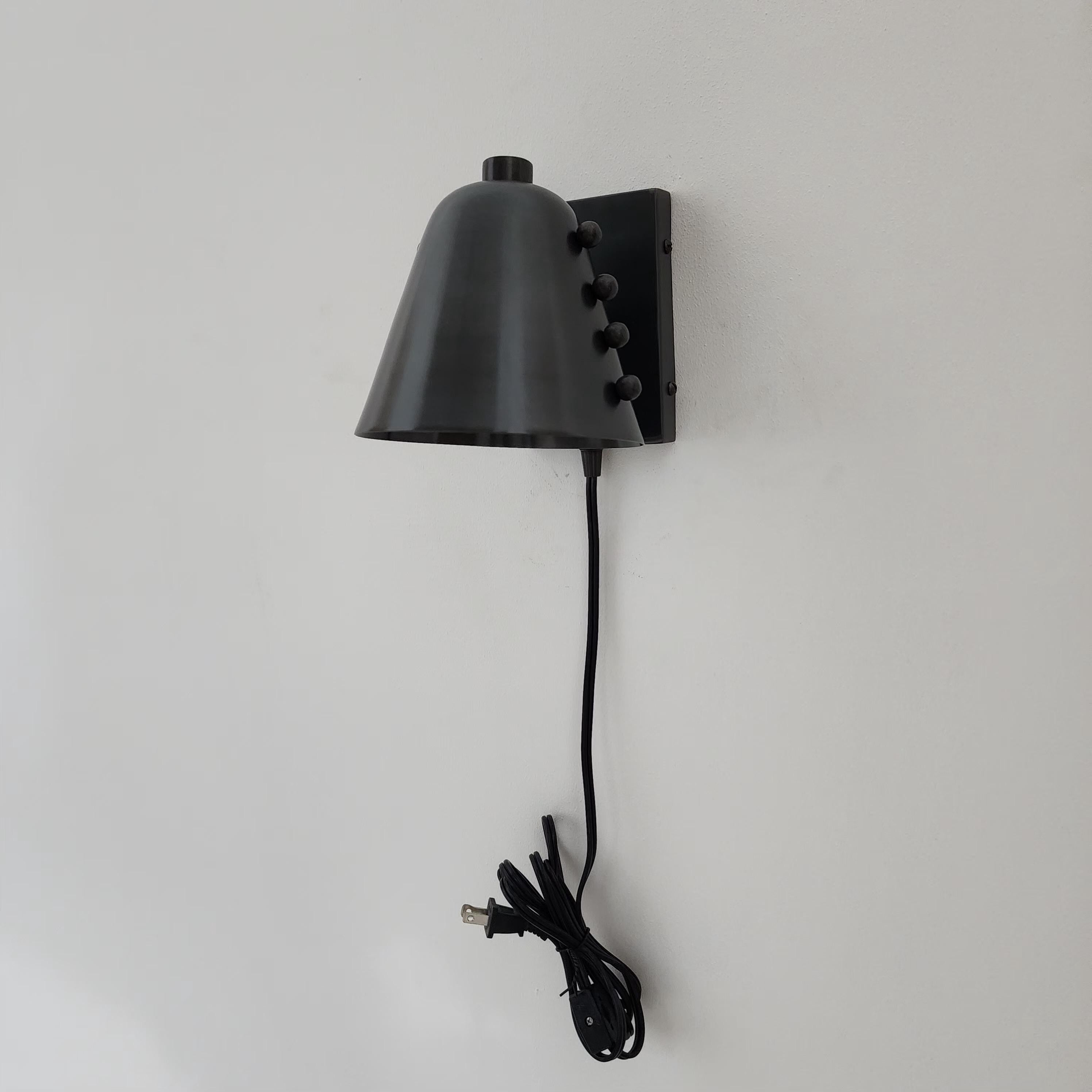 Mid-Century Brass Wall Sconce Bold Cone Design with Antique Black Shade and Rivet Accents