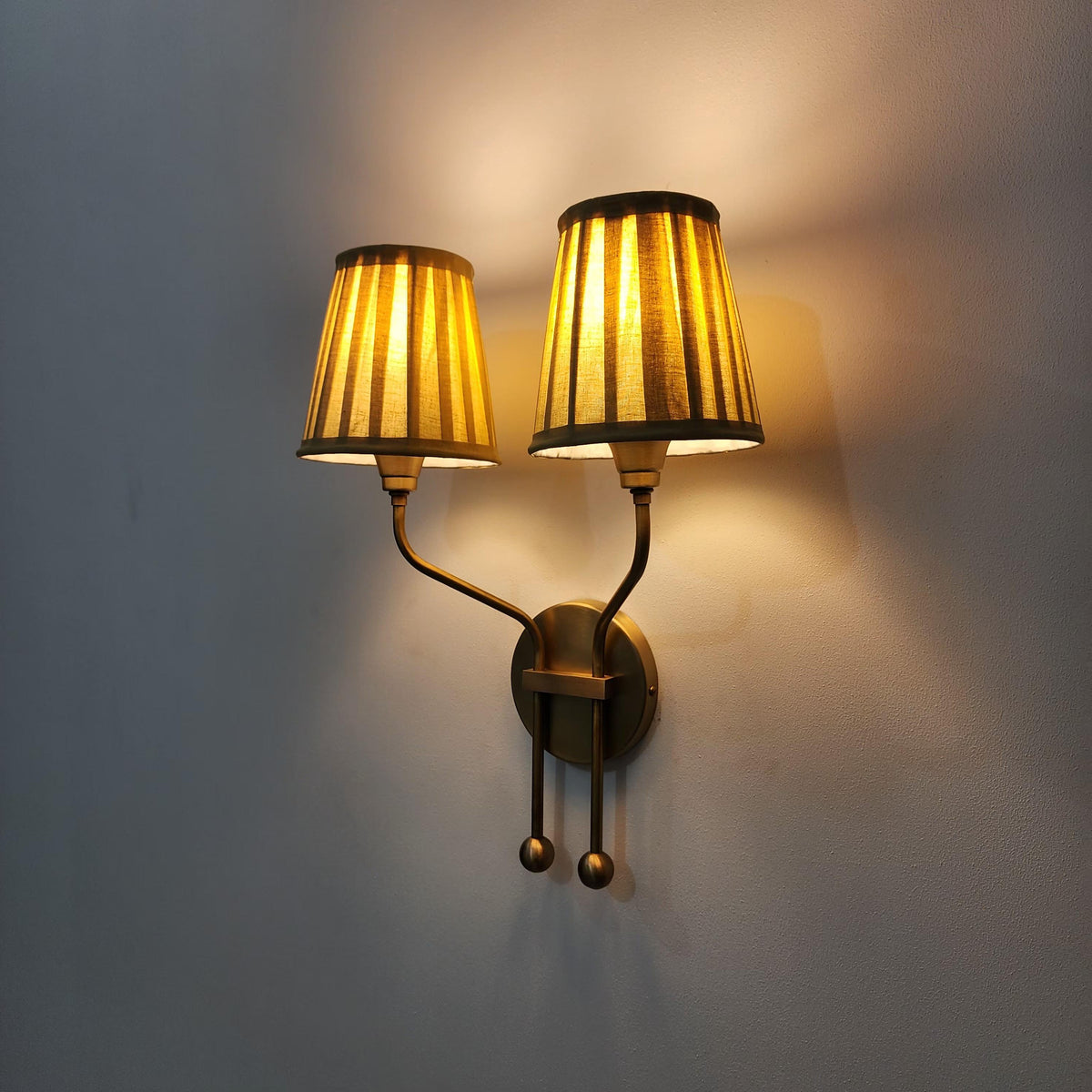 Vintage Double Arm Brass Wall Sconce with Pleated Shades | Elegant Lighting