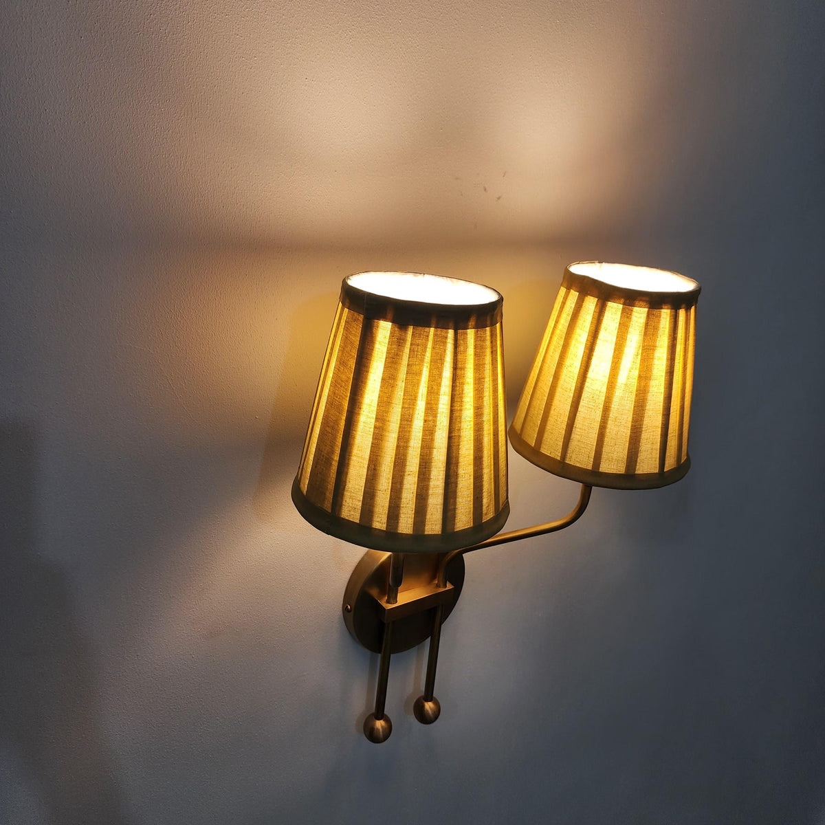 Vintage Double Arm Brass Wall Sconce with Pleated Shades | Elegant Lighting