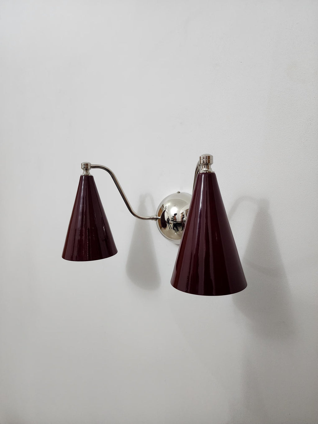 Mid-Century Modern Double Cone Brass Sconce featuring Elegant Wine Shades