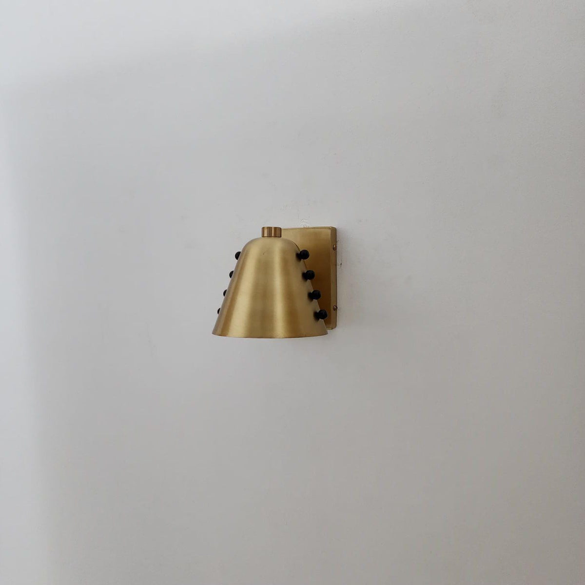Mid-Century Brass Wall Sconce with Bold Cone Design - Ember Lighting