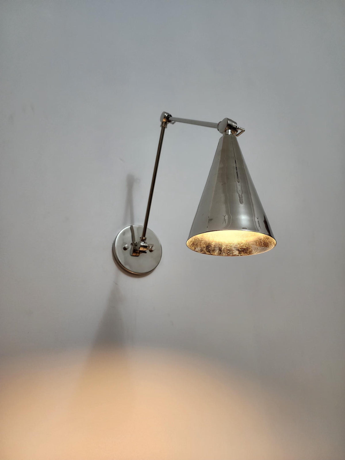 Mid-century Stilnovo Diabolo wall sconce with brass and chrome design. Ember Lighting