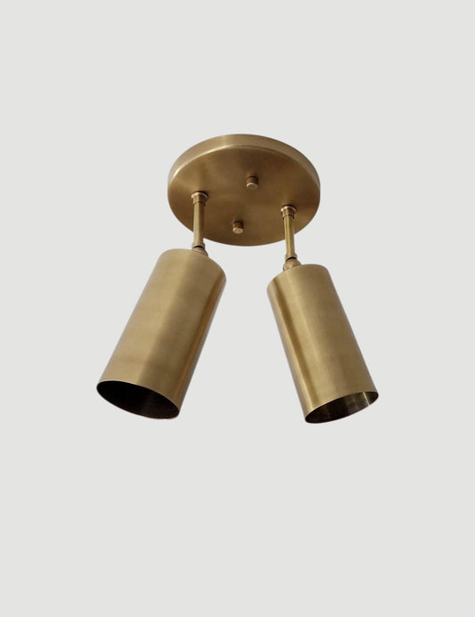 Modern flush mount ceiling light with dual cylindrical shades. Ember Lighting