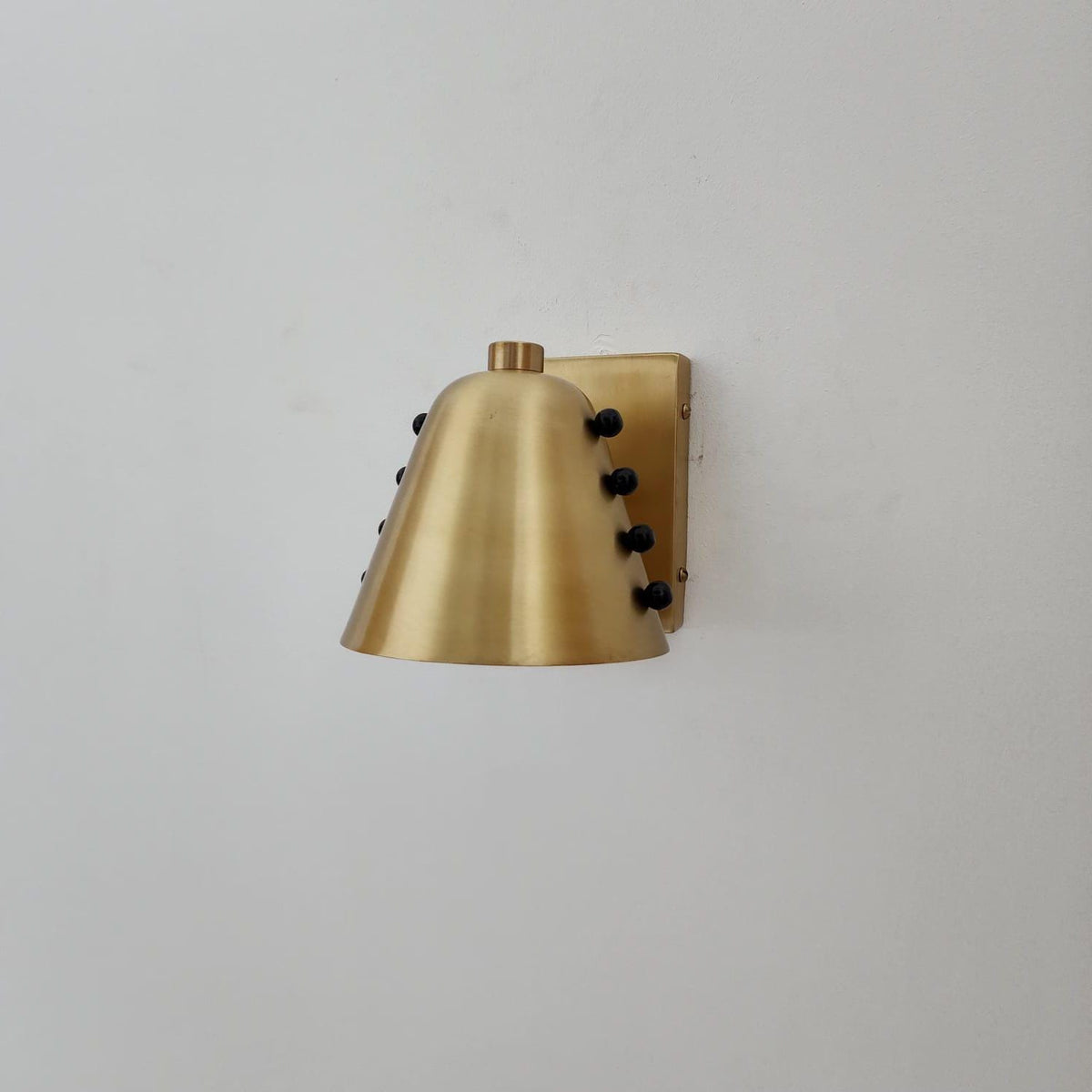 Raw Brass Wall Lamp with Tapered Rivet Shade - Ember Lighting