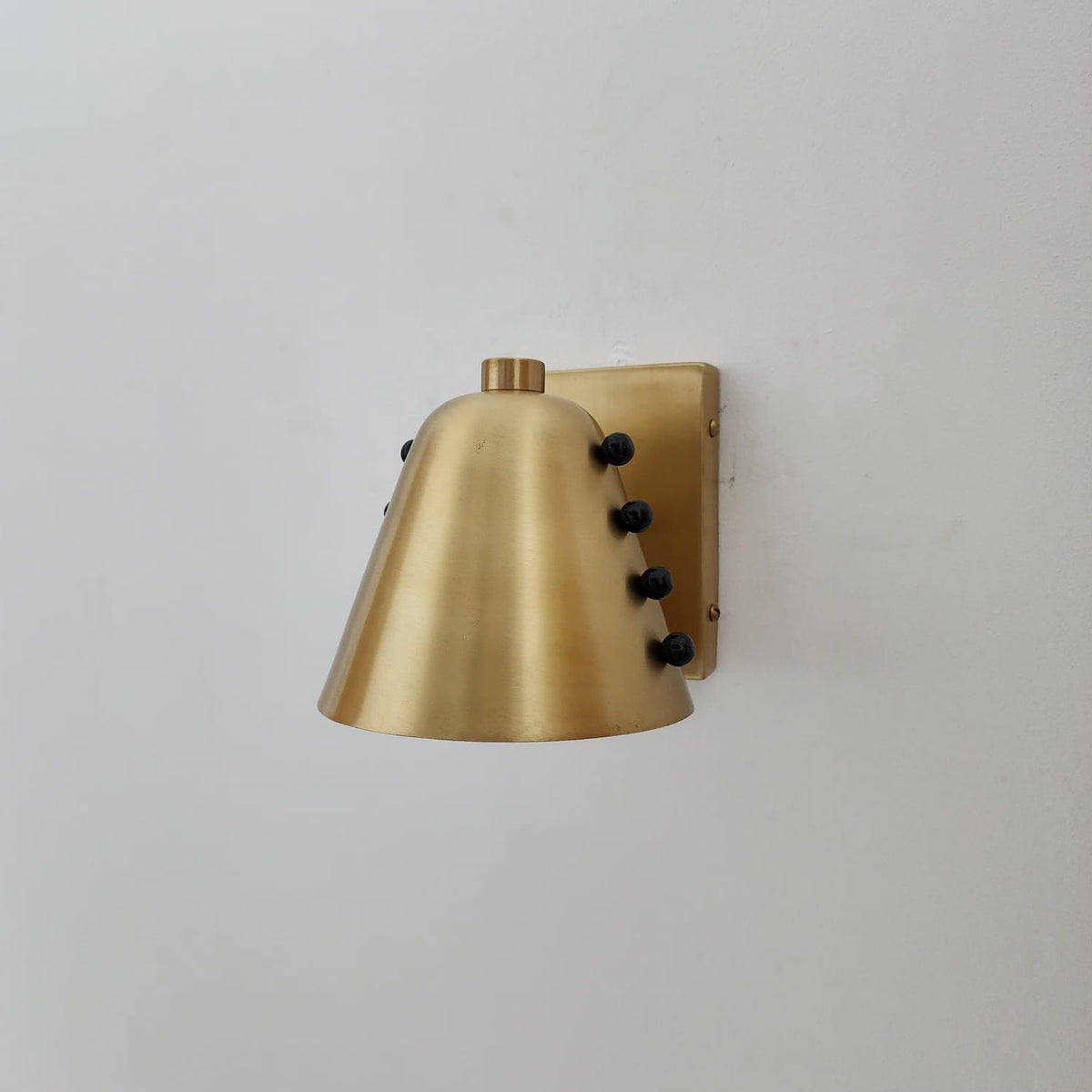 Raw Brass Wall Lamp with Tapered Rivet Shade - Ember Lighting