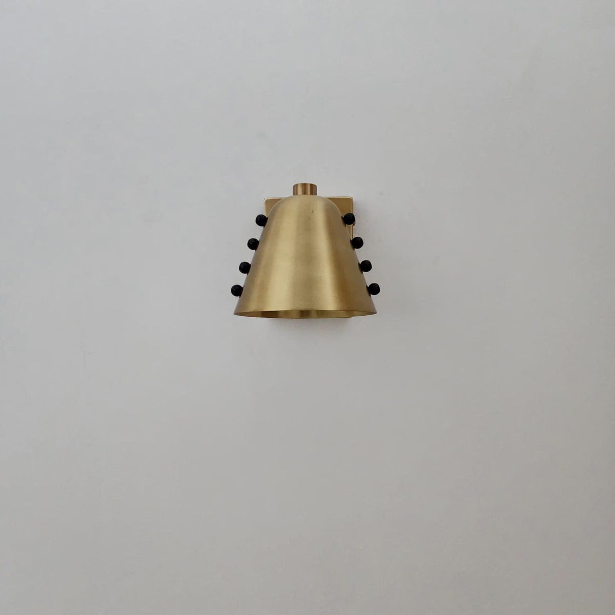 Raw Brass Wall Lamp with Tapered Rivet Shade - Ember Lighting