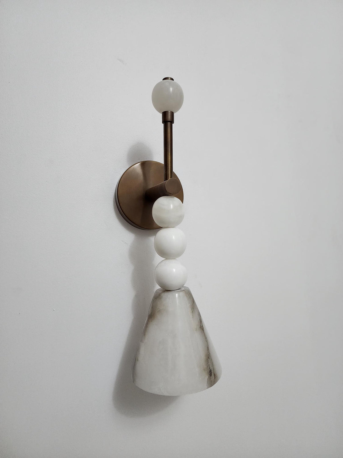 Sculptural Alabaster and Brass Wall Light for Bedroom - Ember Lighting